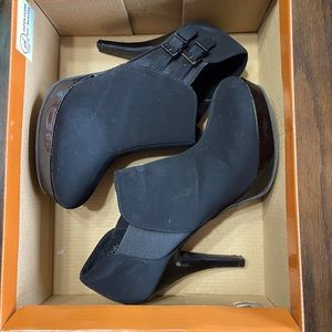 Spike heel black suede shoes